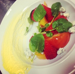Heirloom tomato and Strawberry salad with blue cheese and a roasted corn puree