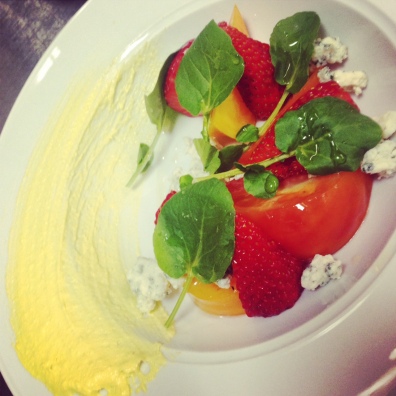 Heirloom tomato and Strawberry salad with blue cheese and a roasted corn puree